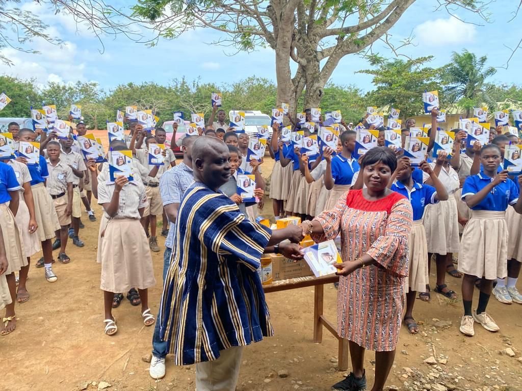 Students receiving donated books
